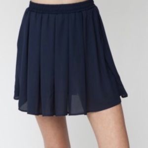 Brandy Melville navy blue flirty mini skirt